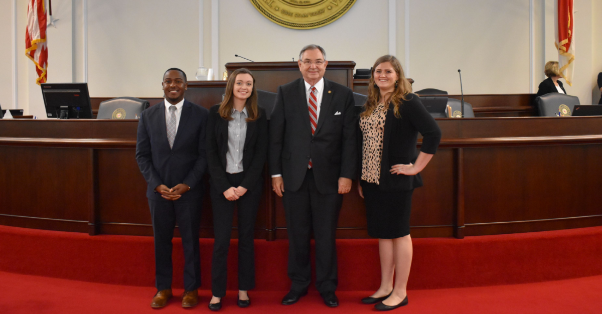 Picture of Campbell University students on the floor of the NC Senate with Senator Jim Burgin